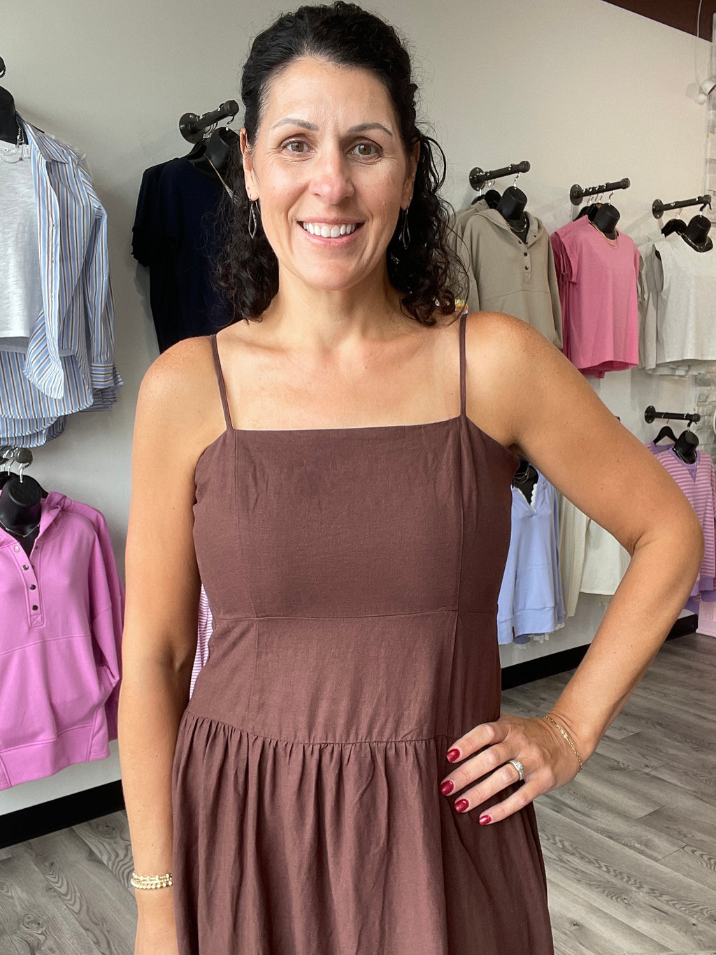 Chocolate cherry colored maxi dress with spaghetti straps and beautiful embroidery at the bottom