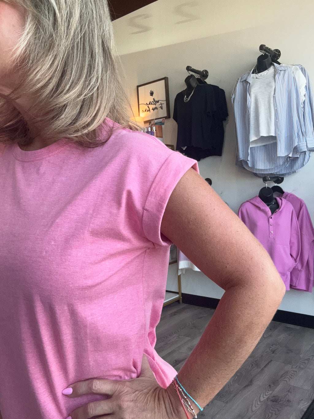 pink tee with rolled sleeves